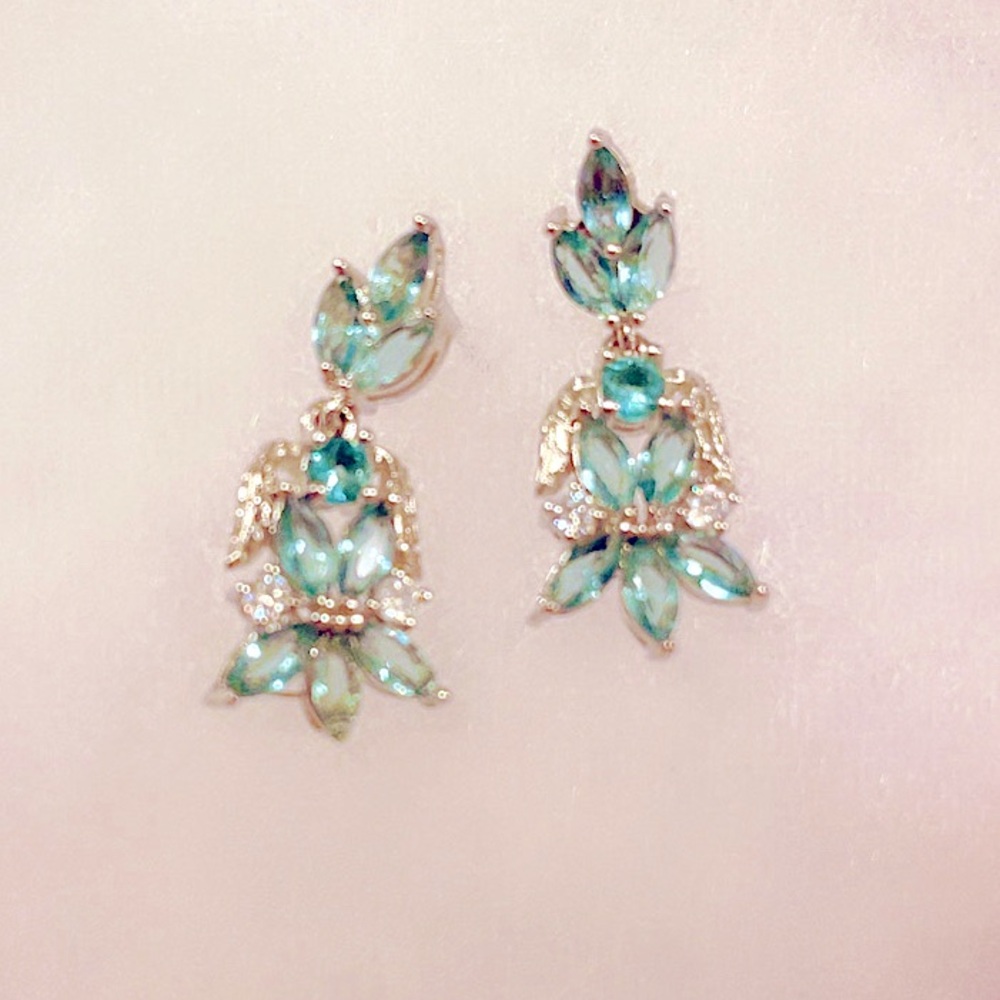 Rhodium blue topaz post dangle earrings